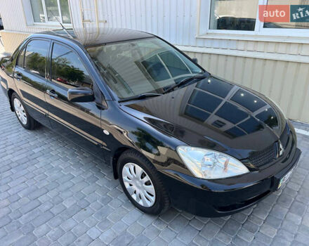 Чорний Міцубісі Lancer, об'ємом двигуна 1.6 л та пробігом 118 тис. км за 4550 $, фото 1 на Automoto.ua