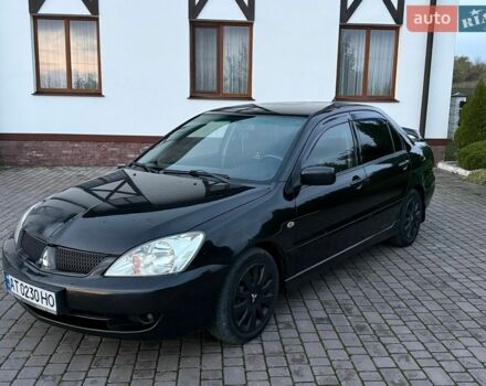 Чорний Міцубісі Lancer, об'ємом двигуна 1.6 л та пробігом 275 тис. км за 3000 $, фото 1 на Automoto.ua