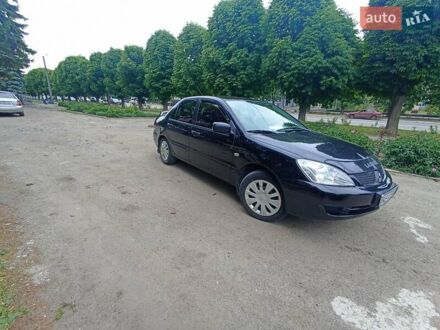 Мицубиси Лансер 2006 в Магалиновке на Automoto.ua Черный Мицубиси Лансер, объемом двигателя 1.59 л и пробегом 243 тыс. км за 3750 $, фото 1 на Automoto.ua