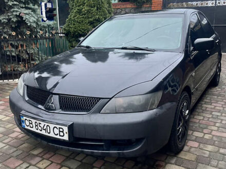 Чорний Міцубісі Lancer, об'ємом двигуна 1.59 л та пробігом 305 тис. км за 2950 $, фото 1 на Automoto.ua