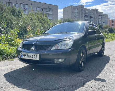 Чорний Міцубісі Lancer, об'ємом двигуна 1.58 л та пробігом 246 тис. км за 3500 $, фото 1 на Automoto.ua