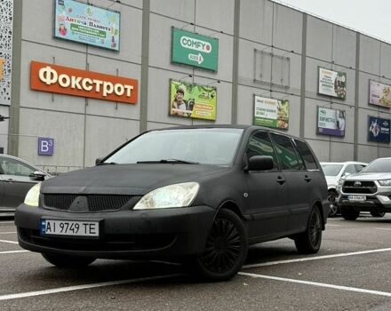 Чорний Міцубісі Lancer, об'ємом двигуна 1.6 л та пробігом 357 тис. км за 3200 $, фото 1 на Automoto.ua