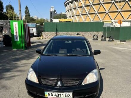 Чорний Міцубісі Lancer, об'ємом двигуна 1.58 л та пробігом 171 тис. км за 5000 $, фото 1 на Automoto.ua