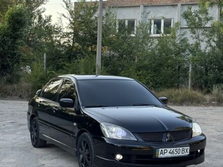 Мицубиси Лансер 2006 в Запорожье на Automoto.ua Черный Мицубиси Лансер, объемом двигателя 2 л и пробегом 170 тыс. км за 5500 $, фото 1 на Automoto.ua