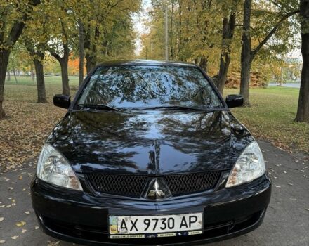 Чорний Міцубісі Lancer, об'ємом двигуна 1.6 л та пробігом 232 тис. км за 3399 $, фото 1 на Automoto.ua