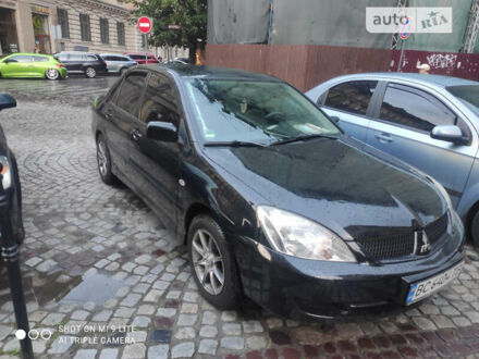 Чорний Міцубісі Lancer, об'ємом двигуна 1.6 л та пробігом 197 тис. км за 4400 $, фото 1 на Automoto.ua