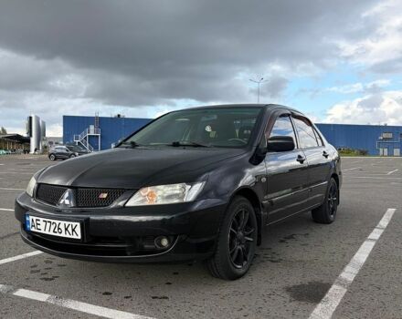 Чорний Міцубісі Lancer, об'ємом двигуна 1.58 л та пробігом 240 тис. км за 4099 $, фото 1 на Automoto.ua