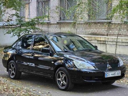 Міцубісі Lancer 2006 у Дніпро (Дніпропетровську) на Automoto.ua Чорний Міцубісі Lancer, об'ємом двигуна 1.6 л та пробігом 200 тис. км за 4399 $, фото 1 на Automoto.ua