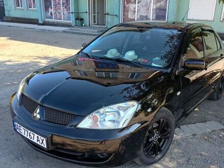 Чорний Міцубісі Lancer, об'ємом двигуна 1.6 л та пробігом 240 тис. км за 5400 $, фото 1 на Automoto.ua