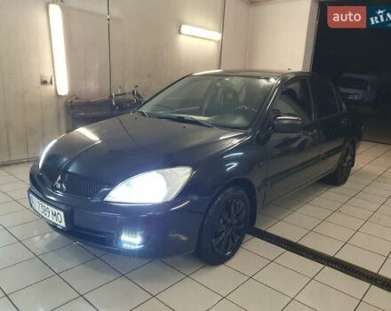Чорний Міцубісі Lancer, об'ємом двигуна 1.58 л та пробігом 222 тис. км за 2999 $, фото 1 на Automoto.ua