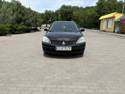 Чорний Міцубісі Lancer, об'ємом двигуна 1.6 л та пробігом 260 тис. км за 4600 $, фото 1 на Automoto.ua