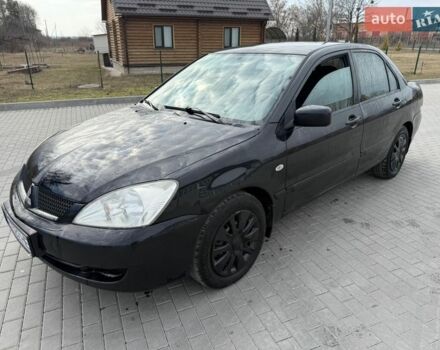 Черный Мицубиси Лансер, объемом двигателя 1.58 л и пробегом 310 тыс. км за 2999 $, фото 1 на Automoto.ua