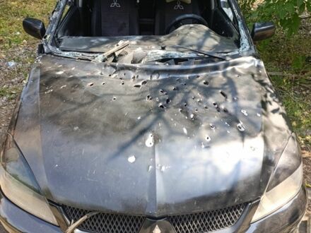 Чорний Міцубісі Lancer, об'ємом двигуна 1.6 л та пробігом 400 тис. км за 1704 $, фото 1 на Automoto.ua