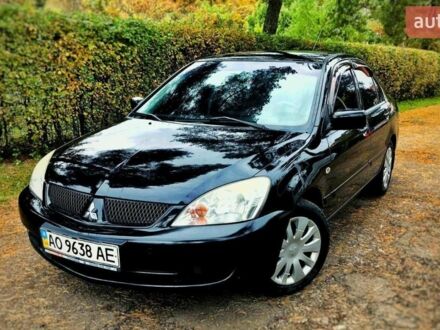 Чорний Міцубісі Lancer, об'ємом двигуна 1.6 л та пробігом 179 тис. км за 4600 $, фото 1 на Automoto.ua