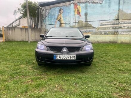 Чорний Міцубісі Lancer, об'ємом двигуна 1.6 л та пробігом 178 тис. км за 5199 $, фото 1 на Automoto.ua