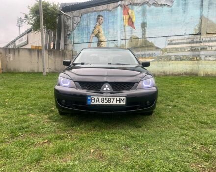 Черный Мицубиси Лансер, объемом двигателя 1.6 л и пробегом 178 тыс. км за 5199 $, фото 1 на Automoto.ua