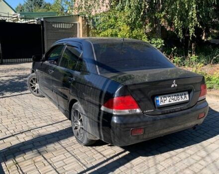 Черный Мицубиси Лансер, объемом двигателя 0 л и пробегом 300 тыс. км за 4300 $, фото 1 на Automoto.ua