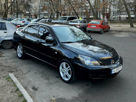 Мицубиси Лансер 2006 в Николаеве на Automoto.ua Черный Мицубиси Лансер, объемом двигателя 2 л и пробегом 245 тыс. км за 5000 $, фото 1 на Automoto.ua