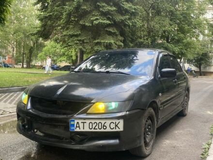 Чорний Міцубісі Lancer, об'ємом двигуна 1.6 л та пробігом 254 тис. км за 2999 $, фото 1 на Automoto.ua