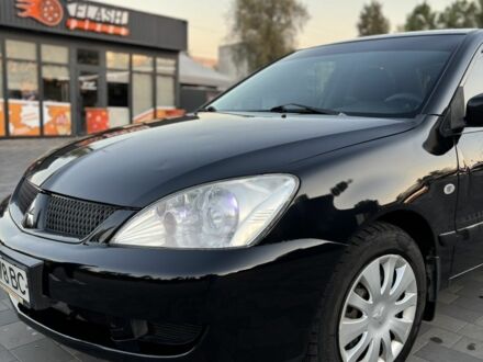 Чорний Міцубісі Lancer, об'ємом двигуна 1.6 л та пробігом 272 тис. км за 4400 $, фото 1 на Automoto.ua