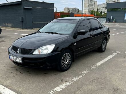 Чорний Міцубісі Lancer, об'ємом двигуна 1.6 л та пробігом 220 тис. км за 4900 $, фото 1 на Automoto.ua