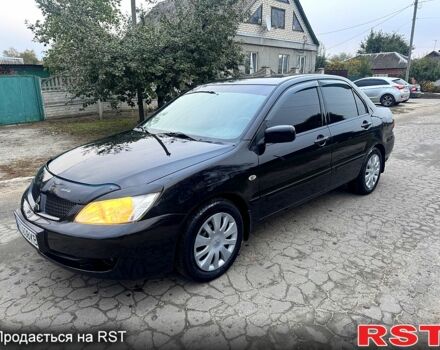 Чорний Міцубісі Lancer, об'ємом двигуна 1.6 л та пробігом 240 тис. км за 5000 $, фото 1 на Automoto.ua