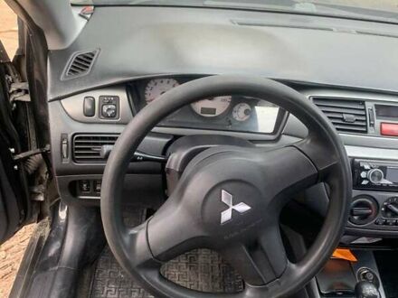 Міцубісі Lancer 2007 у Чернівцях на Automoto.ua Чорний Міцубісі Lancer, об'ємом двигуна 1.58 л та пробігом 220 тис. км за 4000 $, фото 1 на Automoto.ua