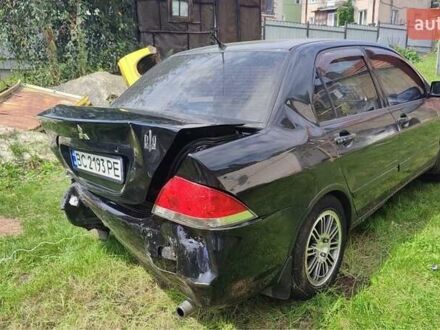 Чорний Міцубісі Lancer, об'ємом двигуна 1.6 л та пробігом 22 тис. км за 1700 $, фото 1 на Automoto.ua