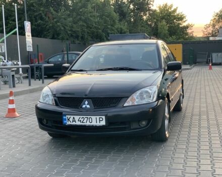 Чорний Міцубісі Lancer, об'ємом двигуна 1.6 л та пробігом 240 тис. км за 3999 $, фото 1 на Automoto.ua