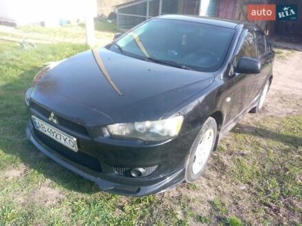 Чорний Міцубісі Lancer, об'ємом двигуна 2 л та пробігом 180 тис. км за 7300 $, фото 1 на Automoto.ua