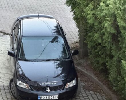 Чорний Міцубісі Lancer, об'ємом двигуна 1.6 л та пробігом 284 тис. км за 2098 $, фото 1 на Automoto.ua