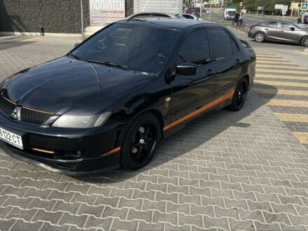 Мицубиси Лансер 2007 в Белой Церкве на Automoto.ua Черный Мицубиси Лансер, объемом двигателя 2 л и пробегом 224 тыс. км за 6000 $, фото 1 на Automoto.ua