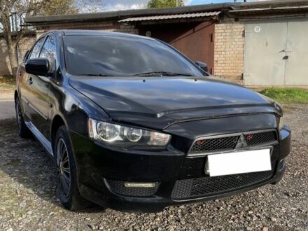 Мицубиси Лансер 2007 в Кривом Роге на Automoto.ua Черный Мицубиси Лансер, объемом двигателя 1.5 л и пробегом 150 тыс. км за 6500 $, фото 1 на Automoto.ua