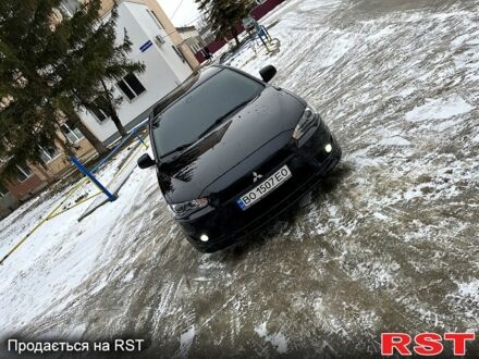 Чорний Міцубісі Lancer, об'ємом двигуна 2 л та пробігом 255 тис. км за 6600 $, фото 1 на Automoto.ua