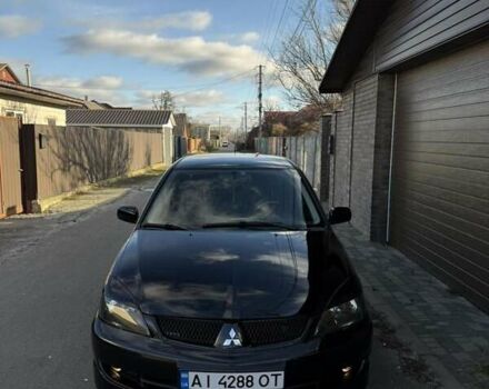 Чорний Міцубісі Lancer, об'ємом двигуна 2 л та пробігом 220 тис. км за 4600 $, фото 1 на Automoto.ua