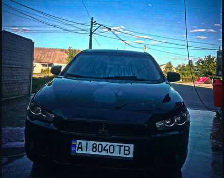 Чорний Міцубісі Lancer, об'ємом двигуна 2 л та пробігом 247 тис. км за 6500 $, фото 1 на Automoto.ua