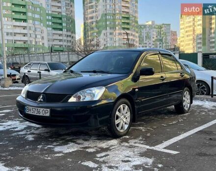 Черный Мицубиси Лансер, объемом двигателя 1.58 л и пробегом 184 тыс. км за 5500 $, фото 1 на Automoto.ua