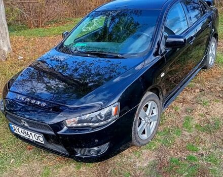 Міцубісі Lancer 2007 у Лозовой на Automoto.ua Чорний Міцубісі Lancer, об'ємом двигуна 2 л та пробігом 190 тис. км за 6500 $, фото 1 на Automoto.ua