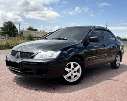 Чорний Міцубісі Lancer, об'ємом двигуна 1.6 л та пробігом 350 тис. км за 3900 $, фото 1 на Automoto.ua