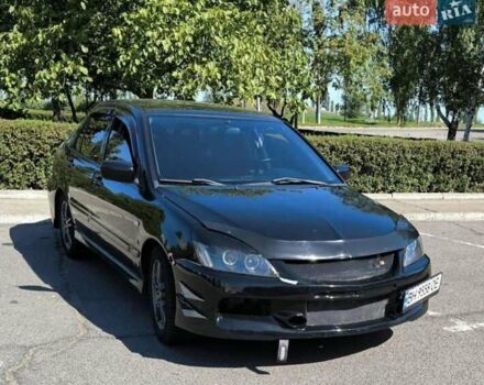 Чорний Міцубісі Lancer, об'ємом двигуна 2 л та пробігом 161 тис. км за 4600 $, фото 1 на Automoto.ua