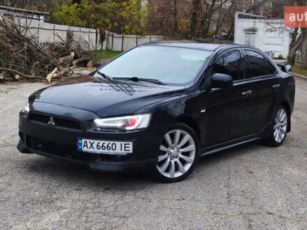 Чорний Міцубісі Lancer, об'ємом двигуна 2 л та пробігом 230 тис. км за 7100 $, фото 1 на Automoto.ua
