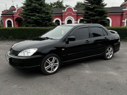 Міцубісі Lancer 2007 у Кам'янське (Дніпродзержинськ) на Automoto.ua Чорний Міцубісі Lancer, об'ємом двигуна 2 л та пробігом 222 тис. км за 4900 $, фото 1 на Automoto.ua