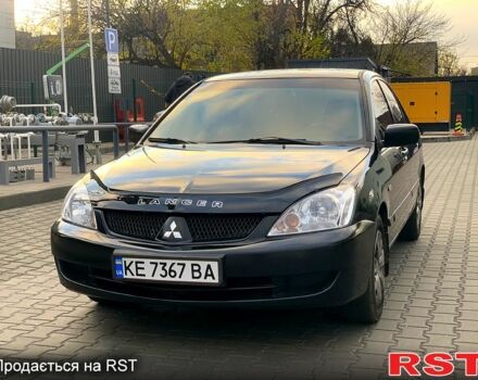 Черный Мицубиси Лансер, объемом двигателя 1.6 л и пробегом 237 тыс. км за 3850 $, фото 1 на Automoto.ua