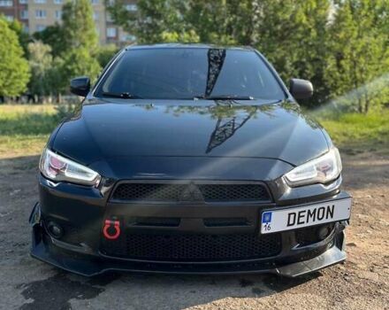 Чорний Міцубісі Lancer, об'ємом двигуна 2 л та пробігом 226 тис. км за 6500 $, фото 1 на Automoto.ua