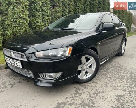 Чорний Міцубісі Lancer, об'ємом двигуна 2 л та пробігом 69 тис. км за 6200 $, фото 1 на Automoto.ua