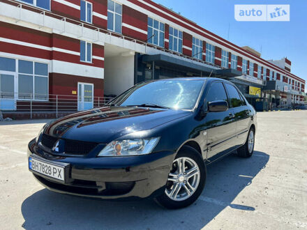 Чорний Міцубісі Lancer, об'ємом двигуна 1.6 л та пробігом 310 тис. км за 4999 $, фото 1 на Automoto.ua