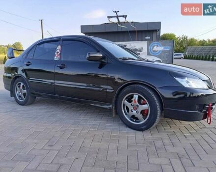 Чорний Міцубісі Lancer, об'ємом двигуна 1.6 л та пробігом 320 тис. км за 4500 $, фото 1 на Automoto.ua