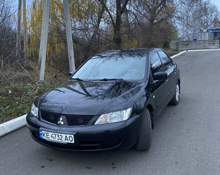 Черный Мицубиси Лансер, объемом двигателя 1.58 л и пробегом 213 тыс. км за 4900 $, фото 1 на Automoto.ua