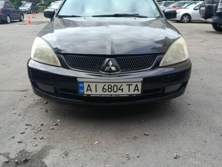Чорний Міцубісі Lancer, об'ємом двигуна 1.6 л та пробігом 420 тис. км за 3650 $, фото 1 на Automoto.ua