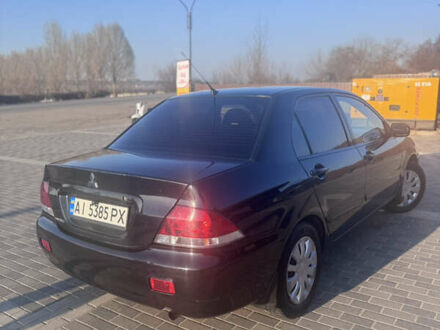 Міцубісі Lancer 2007 у Ирпене на Automoto.ua Чорний Міцубісі Lancer, об'ємом двигуна 1.58 л та пробігом 201 тис. км за 5000 $, фото 1 на Automoto.ua